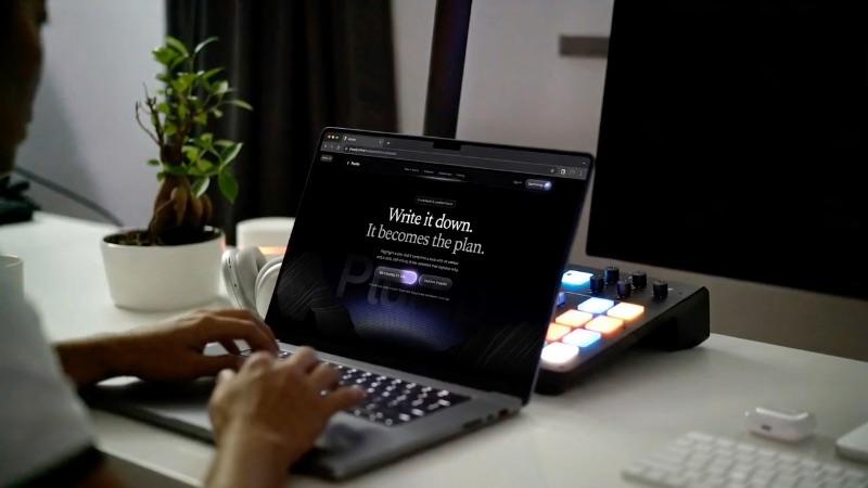 Start on the first frame of reference image 2 and keep it exactly as it is: the person at the white desk typing on the dark…